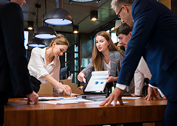 Group of professional workers in conference room