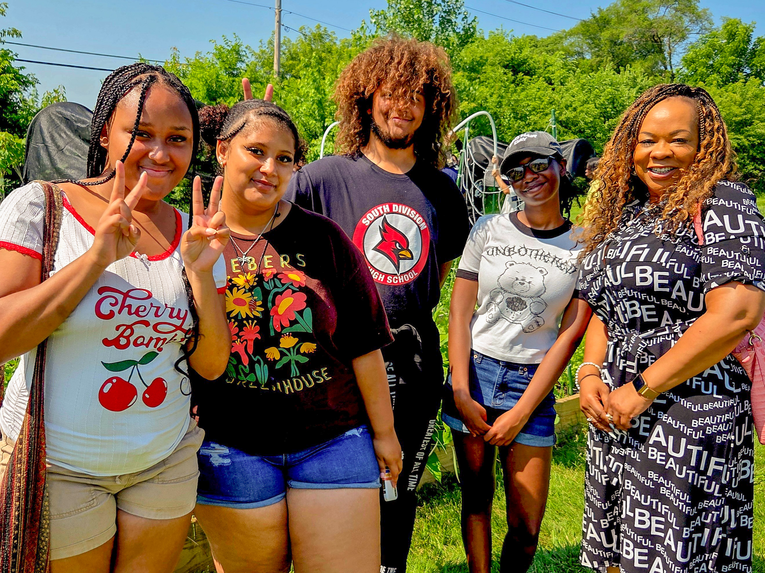 Teens Grow Greens participants with DET Administrator Michele Carter