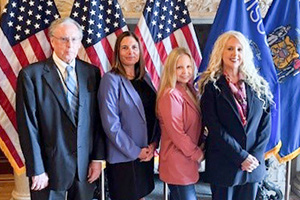 DWD staff present as Act 33 is signed