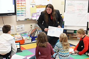 Matthew Jacobson teaching young students