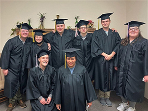 Graduates from the 2022 Aspirus Riverview Project SEARCH class pose for a photo with DWD Assistant Deputy Secretary Danielle Williams.