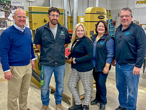Equipment purchased in part through a Wisconsin Fast Forward Technical Education Equipment Grant is helping to train more students at Coleman High School. (Pictured L-R): Coleman High School Principal Douglas Polomis, Tech Ed teacher Derek Tate, Department of Workforce Development Secretary-designee Amy Pechacek, Jody and Jamie Graetz with Graetz Manufacturing, during a tour of Coleman High School's technical education classrooms.