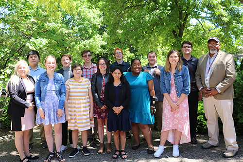 Graduates from the 2022 Milwaukee County Zoo Project SEARCH program pose for a photo with DWD Secretary-designee Amy Pechacek and Milwaukee County Zoo Director Amos Morris.