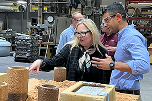 people working in an aluminum foundry