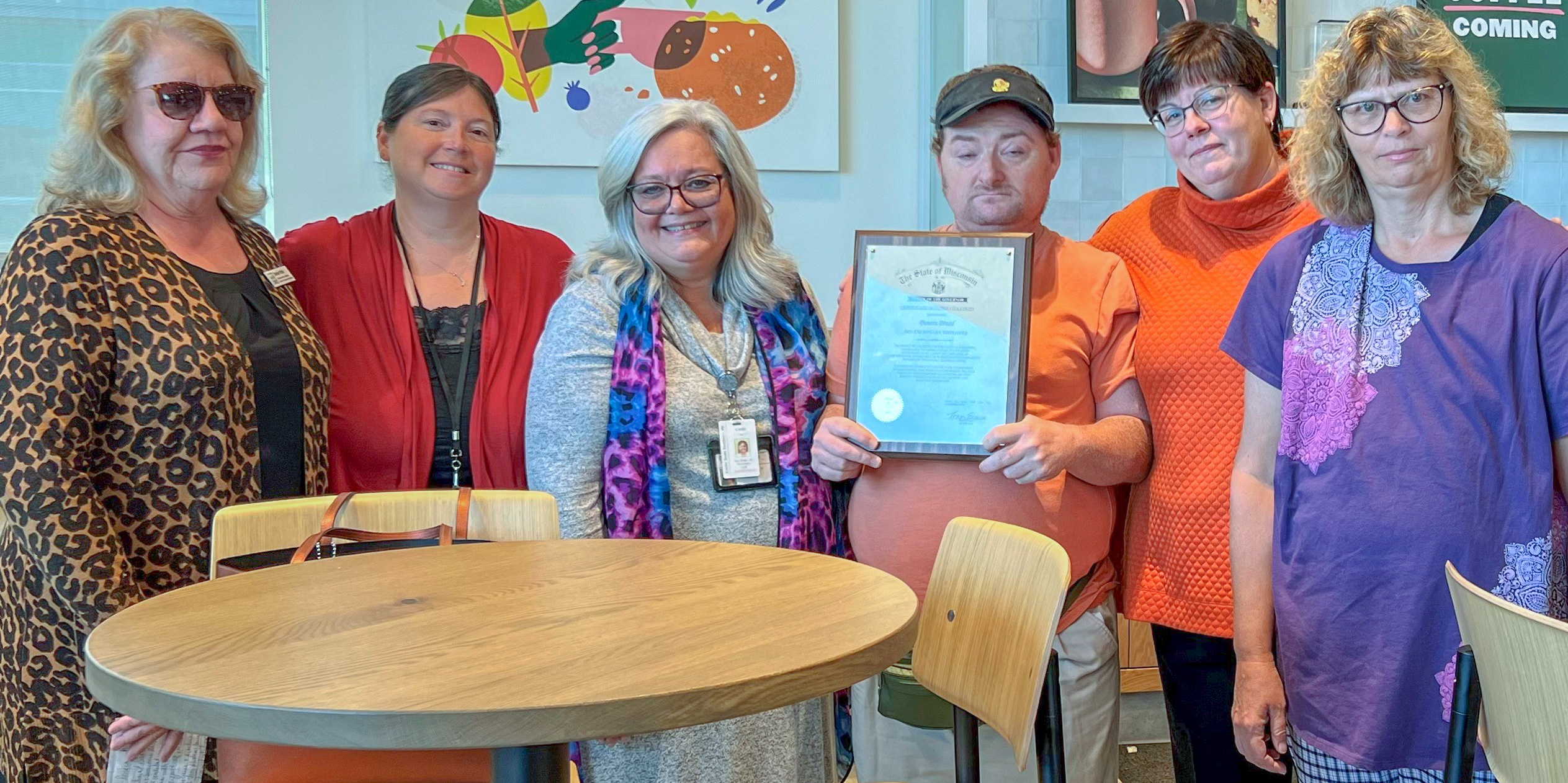 Left to right: Denise Puffer, DVR Business Services Consultant; Amy May, DVR Area Director; Linda Linscott, Easterseals Southeast Wisconsin Workforce Development Specialist; Kirby Taylor, Panera Bread Employee; Mary Jo Aceto, Panera Bread General Manager; and Leia McCann, Panera Bread Employee.