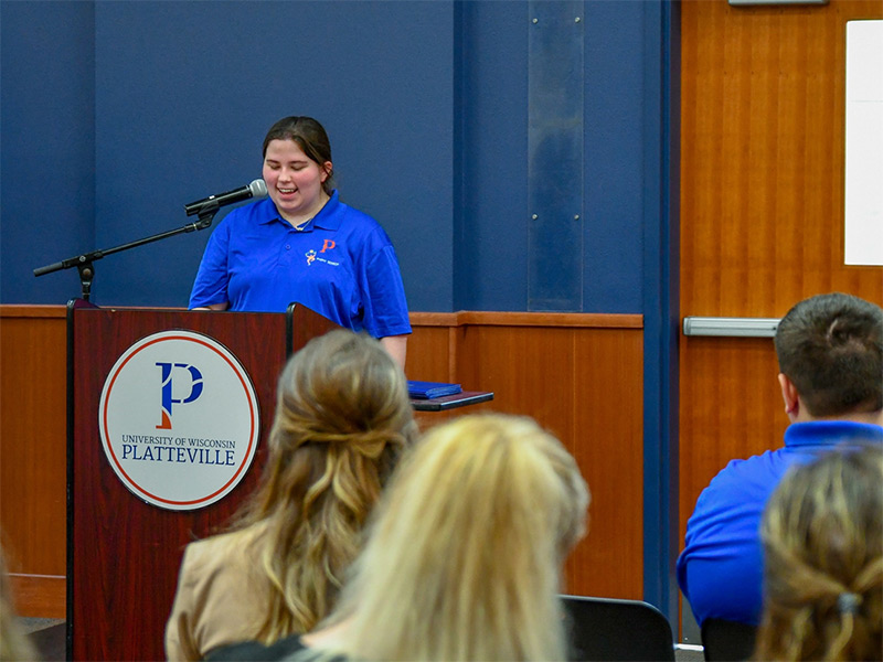 Genesis Burtsfield addresses the crowd at UW-Platteville's Project SEARCH graduation