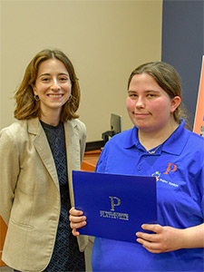 DWD Legislative Liaison Arielle Exner poses for a photo with Genesis Burtsfield