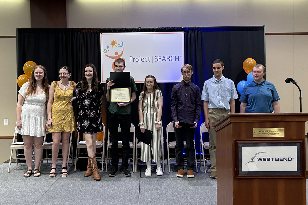 Project SEARCH graduates at West Bend Insurance pose for group photo