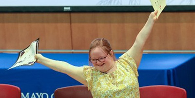 With her graduation certificate in hand, Thea Lenhart danced off the stage to join her family and fellow graduates for cookies and lemonade after the graduation.