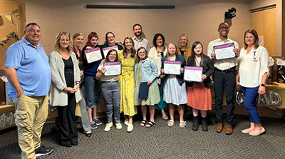 Graduates and staff pose for a picture at the conclusion of the River Falls Hospital Project SEARCH Graduation.