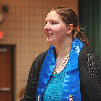 Project SEARCH graduate Paige L. Appling smiles after receiving her certificate.