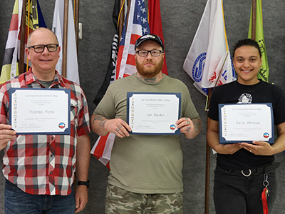 Construction class graduates held at Lac Courte Oreilles Ojibwe College. Pictured above: Tom P., Jon B., and De'Ja W.